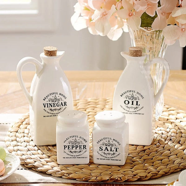 4-piece kitchen cruet jar set containing an oil jar, vinegar jar, salt shaker and pepper shaker for organised condiment storage.