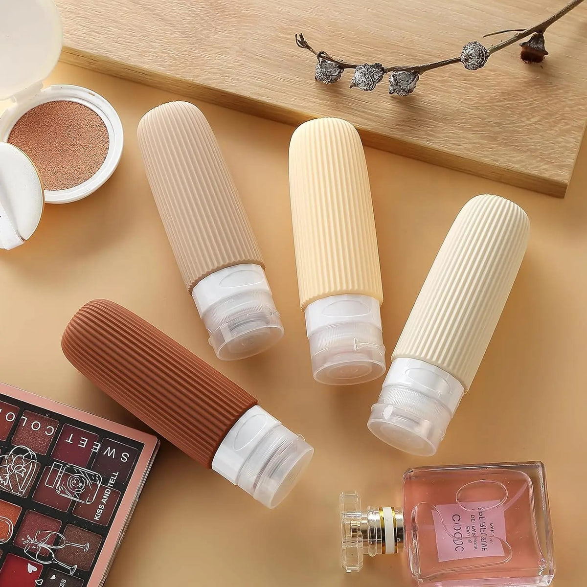 silicone travel lotion bottles set for carrying shampoo, conditioner, lotion, and liquid toiletries while travelling.