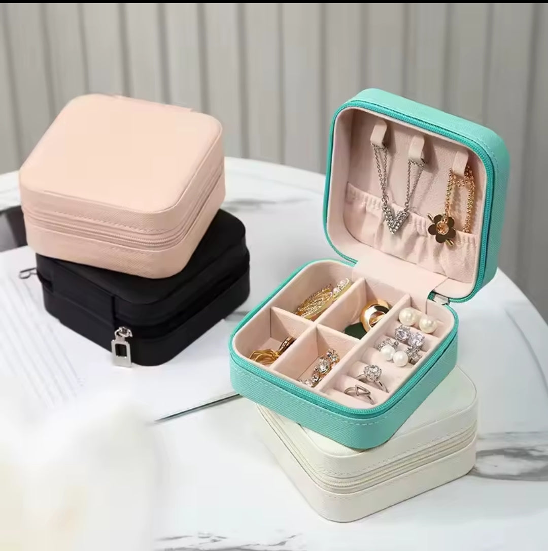 Mini jewelry travel case with PU leather exterior and velvet interior for jewelry storage