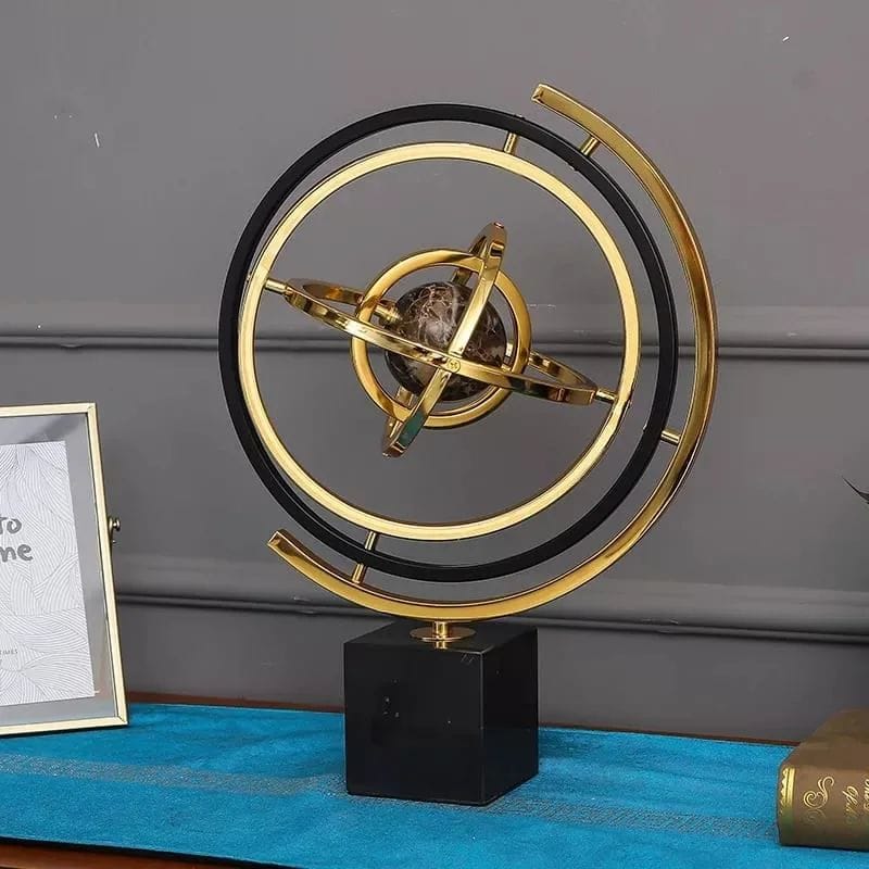 Homary modern abstract art metal globe ornament displayed on a table as contemporary home decor.