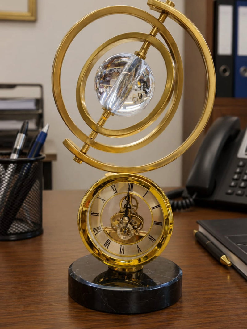 Gemelli Collections retro Nordic gold table clock with crystal sphere armillary design and black marble base