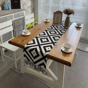 Nordic geometric table runner measuring 35 x 250cm with stain-resistant heavy construction, available in black and brown for dining table décor and protection