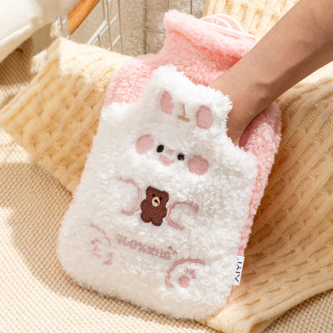 1 litre hot water bottle in white light brown pink and dark brown for comfortable warmth and everyday home use