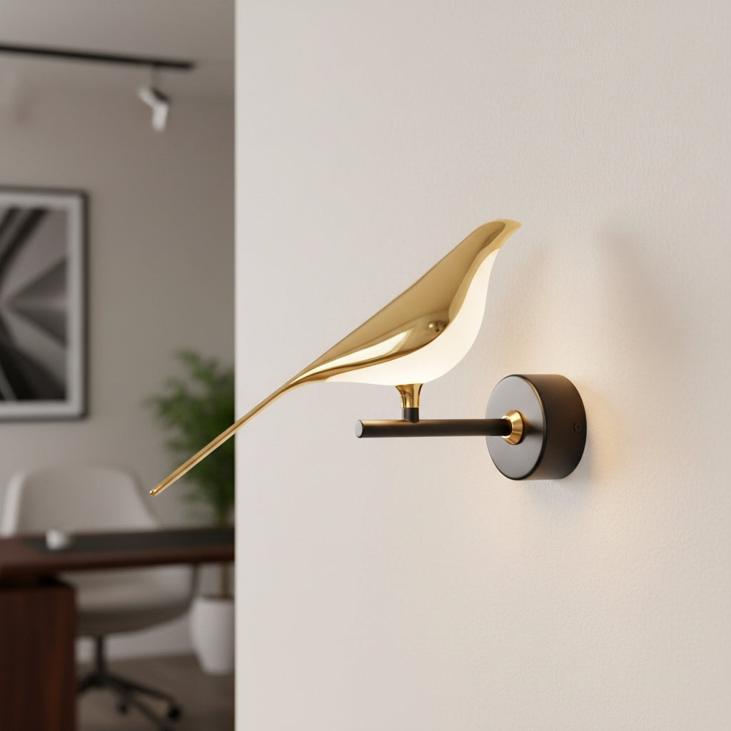 Gemelli Collections Gold Bird LED Wall Lamp with illuminated white bird, matte black arm, and luxury wall-mounted lighting fixture.