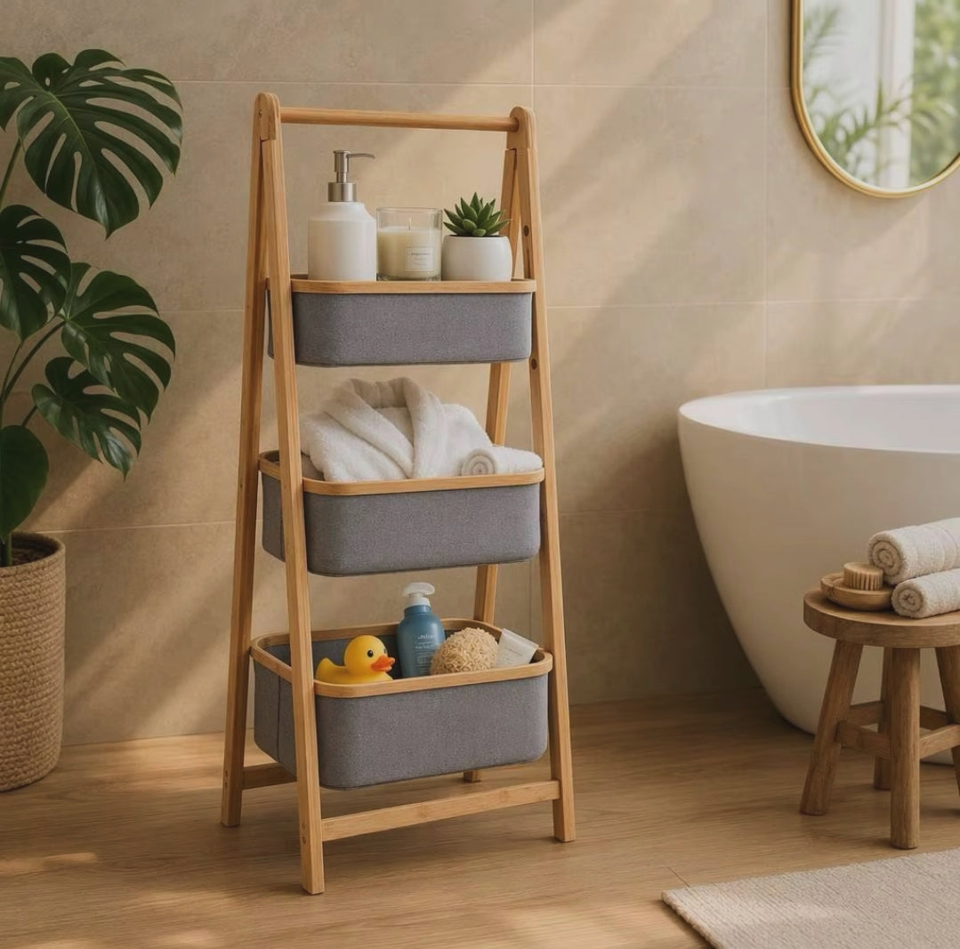 Foldable bamboo laundry hamper with pull out fabric baskets and storage shelf for organising laundry in bathrooms bedrooms and laundry rooms.
