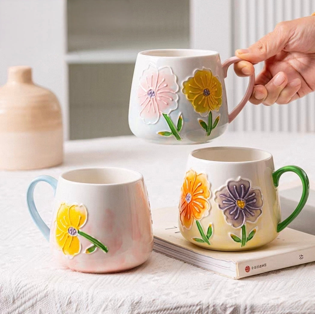 hand-painted embossed flower mug 450ml decorative floral coffee mug artistic ceramic tea cup with textured flower design available in three unique prints for hot and cold beverages.