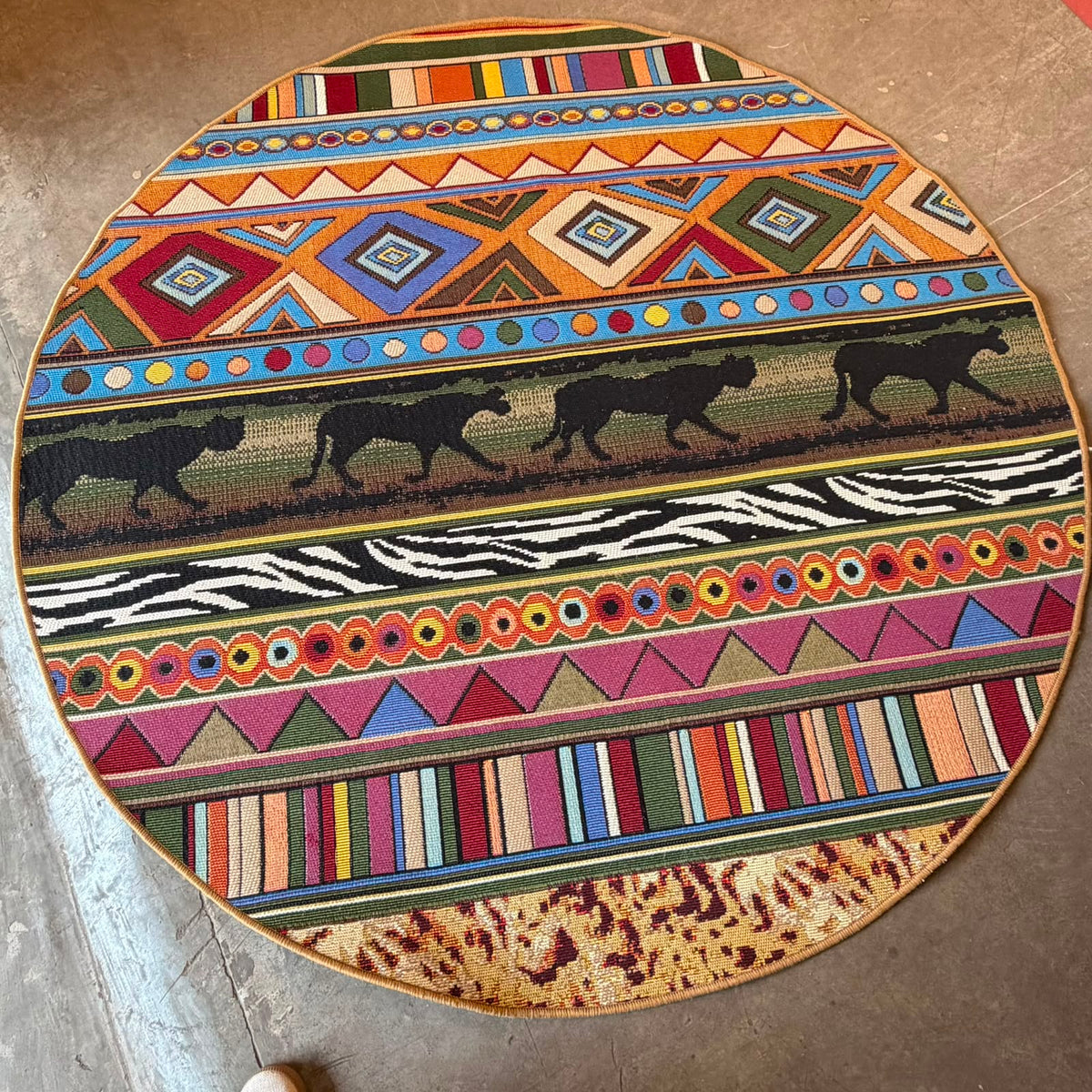 Oriental Weavers Isla round outdoor polypropylene rug with tribal geometric and safari animal print design.