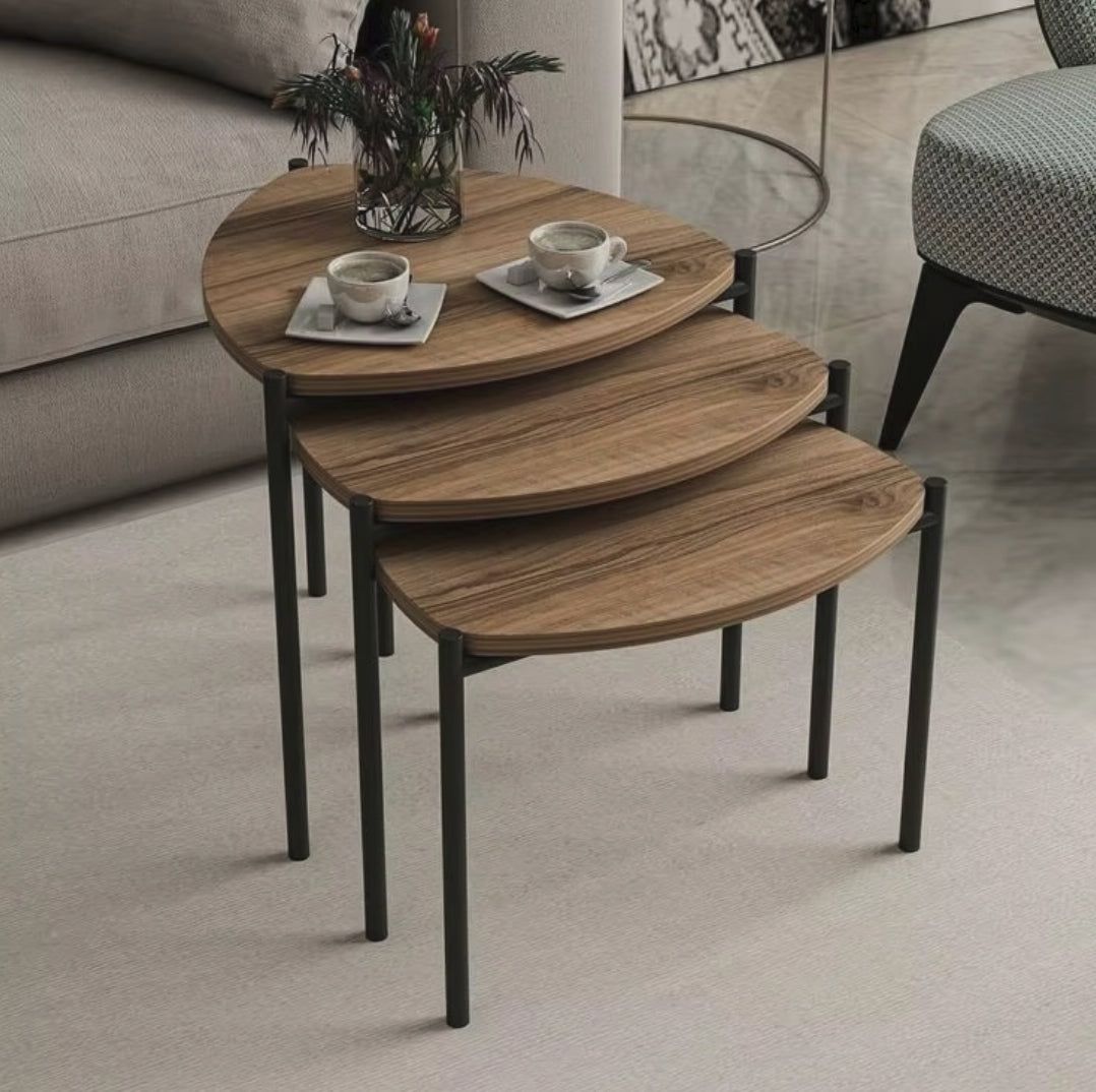 3 piece nesting coffee table set with triangular fan shaped design and space saving nesting structure for living room and office use.