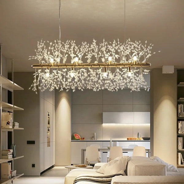 Gold linear crystal branch chandelier with upward and downward twig-style crystals and warm LED lighting for modern luxury interiors.