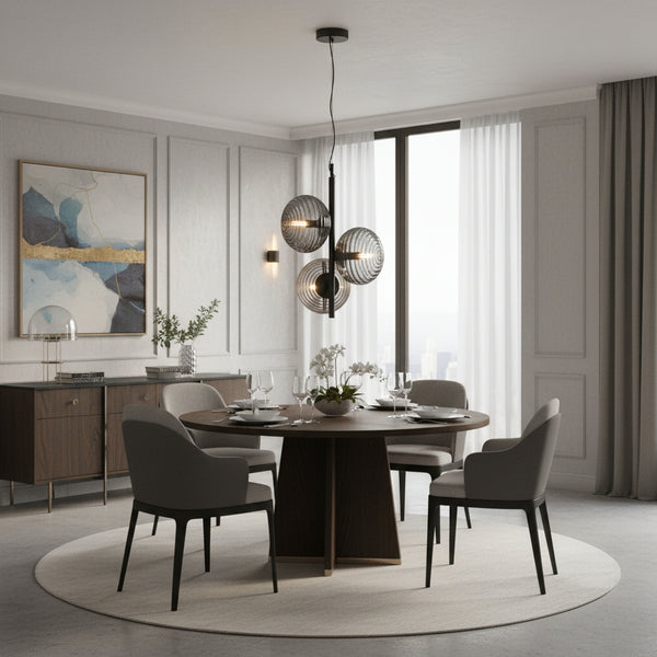 Black sculptural pendant light with three ribbed smoked glass shades in staggered arrangement for modern ambient interior lighting.