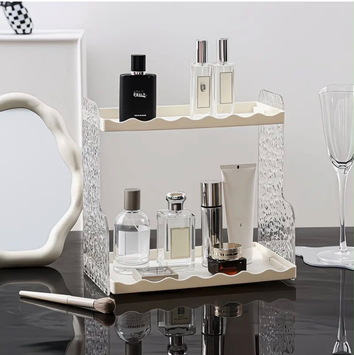 Glacier pattern vanity and storage rack with multiple compartments for organising cosmetics, skincare, jewellery, and everyday accessories, available in black and cream white.
