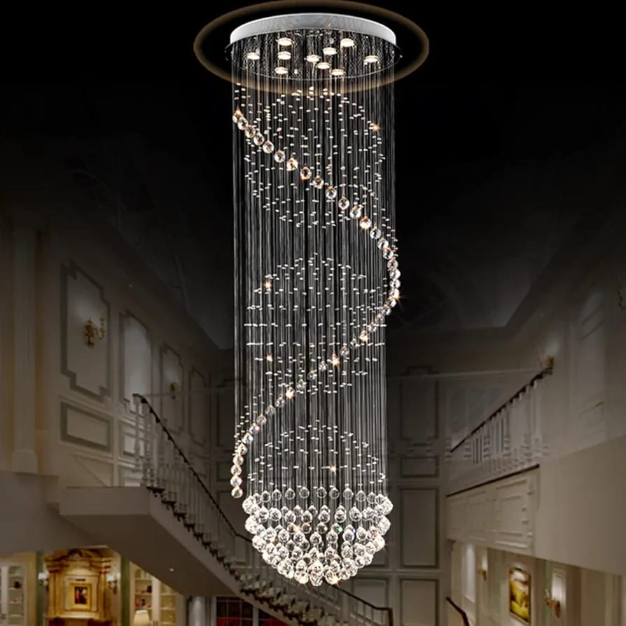 Spiral crystal rain chandelier with cascading K9 crystal beads and balls suspended on steel cables forming a dramatic waterfall effect for double-height spaces.