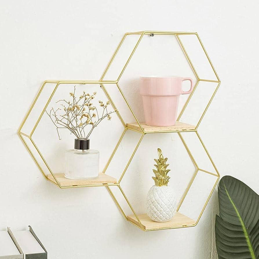 Gemelli Collections 3-piece gold hexagon wall shelf set with natural wood bases in a honeycomb floating design for modern home décor.
