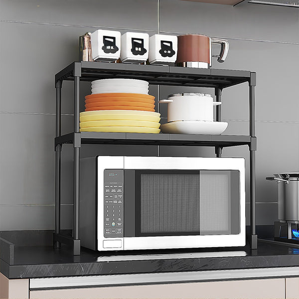 2-layer microwave and multipurpose storage rack with breathable hollow design, dust- and water-resistant construction, suitable for kitchen appliances, pantry items, and household organisation.