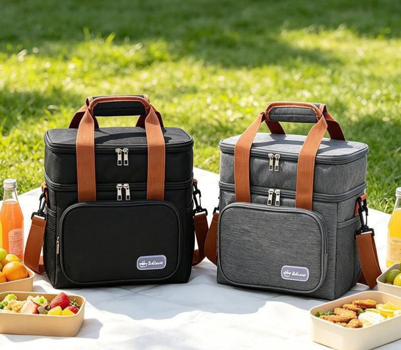 Insulated lunch bag with high-density polyester exterior and leak-resistant PEVA lining portable food carrier for work school picnics beach outings and daily meal storage available in black brown grey and blue.