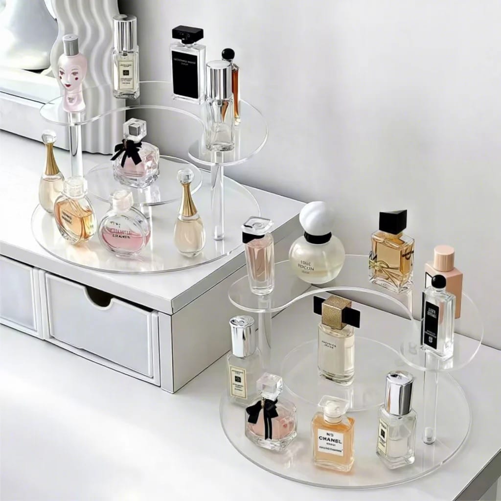Acrylic round perfume display rack for organising and displaying perfumes, cosmetics, and skincare products.
