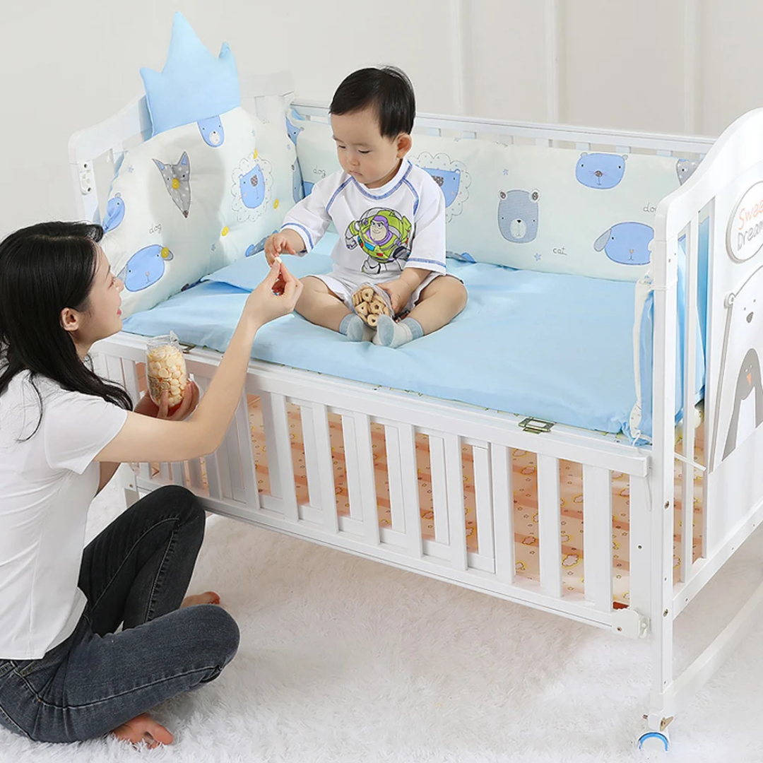 wooden baby crib cosleeper with mosquito net in white