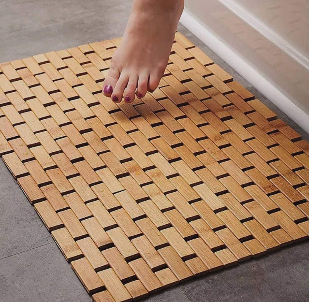 Bamboo bathroom shower step mat measuring 60cm x 90cm with slatted drainage design for bathrooms, shower areas, bathtubs, dressing areas, saunas, and spas