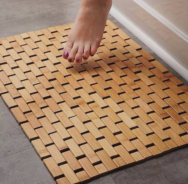 Bamboo bathroom shower step mat measuring 60cm x 90cm with slatted drainage design for bathrooms, shower areas, bathtubs, dressing areas, saunas, and spas