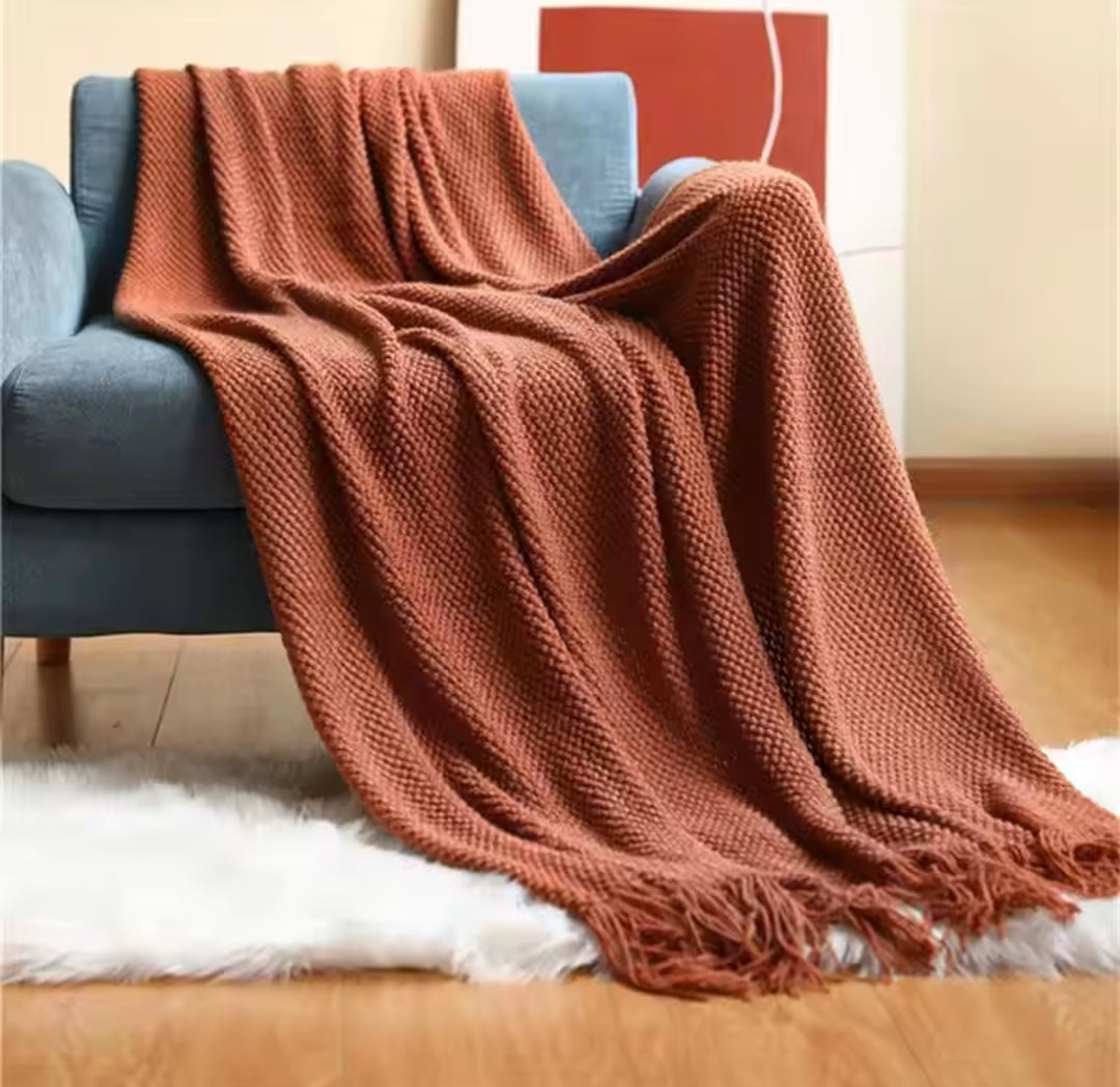 Knitted throw blanket