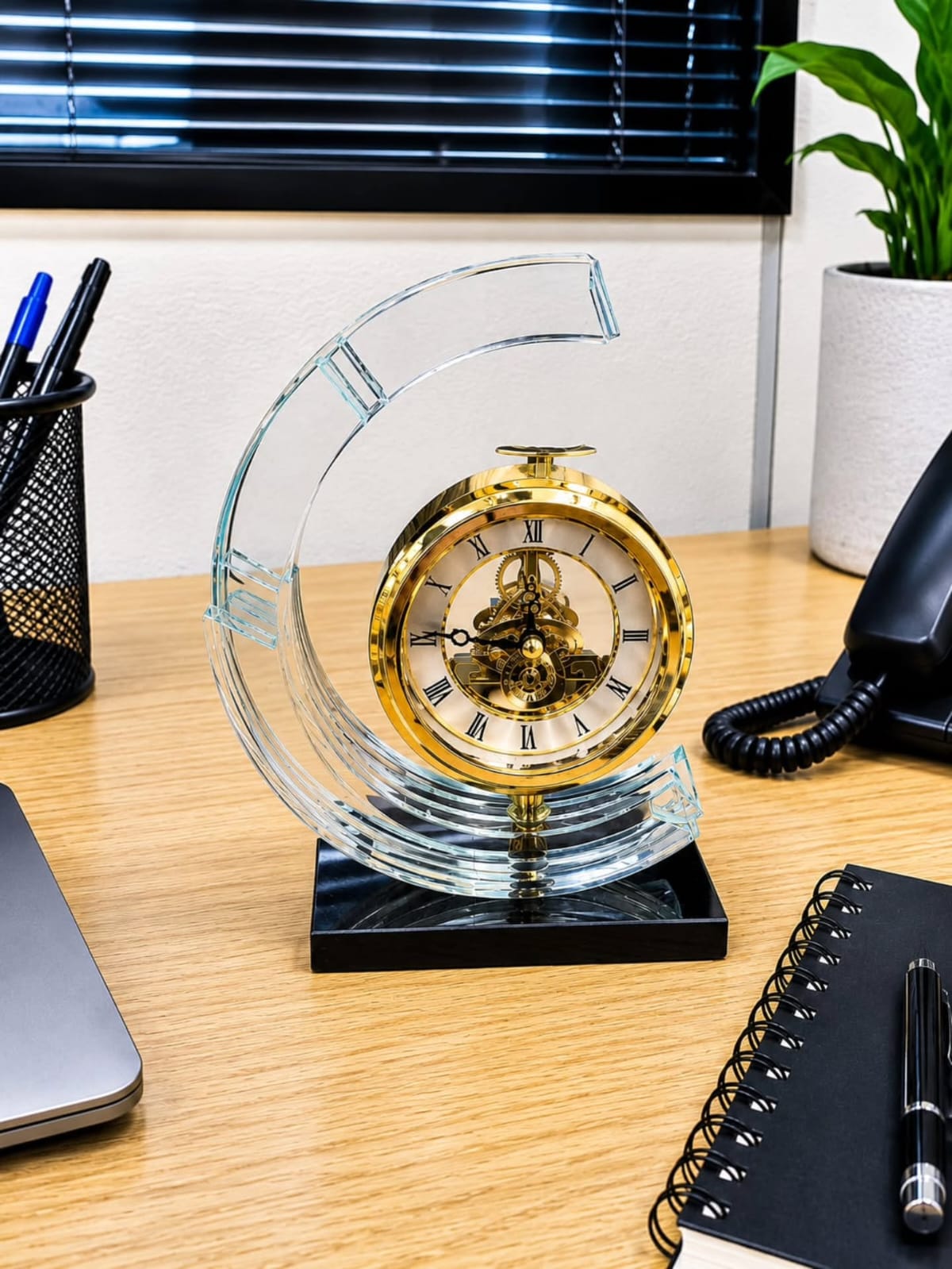 Gemelli Collections gold skeleton mantel clock with crystal glass arch frame and black base