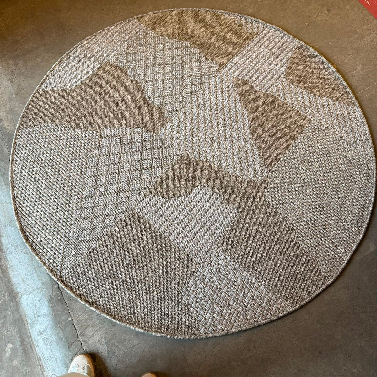 Alt Text
Oriental Weavers Oria round abstract geometric flat weave rug in beige and taupe polypropylene for indoor living spaces.