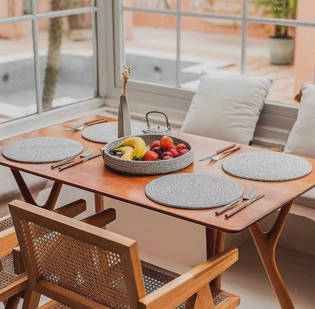 4 piece cotton rope woven table mat set with holder in off white and grey featuring heat resistant non slip design for dining table protection and décor.