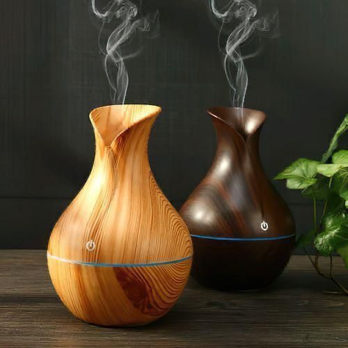 Wooden ultrasonic humidifier and diffuser with 130ml capacity for essential oils indoor air moisture and home or office ambience