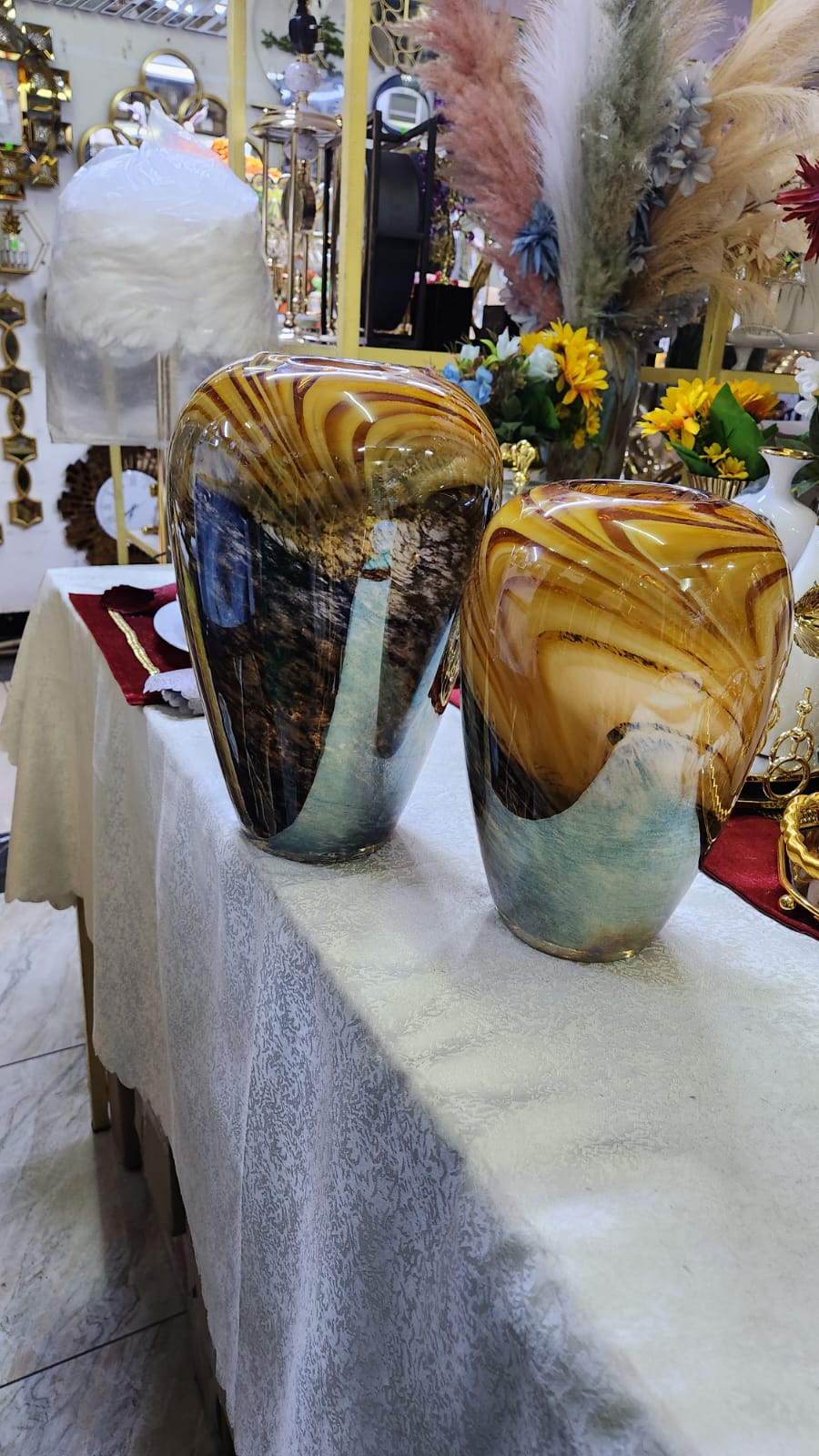 Handblown Amber Swirl Glass vase with caramel, brown, and smoke grey patterns