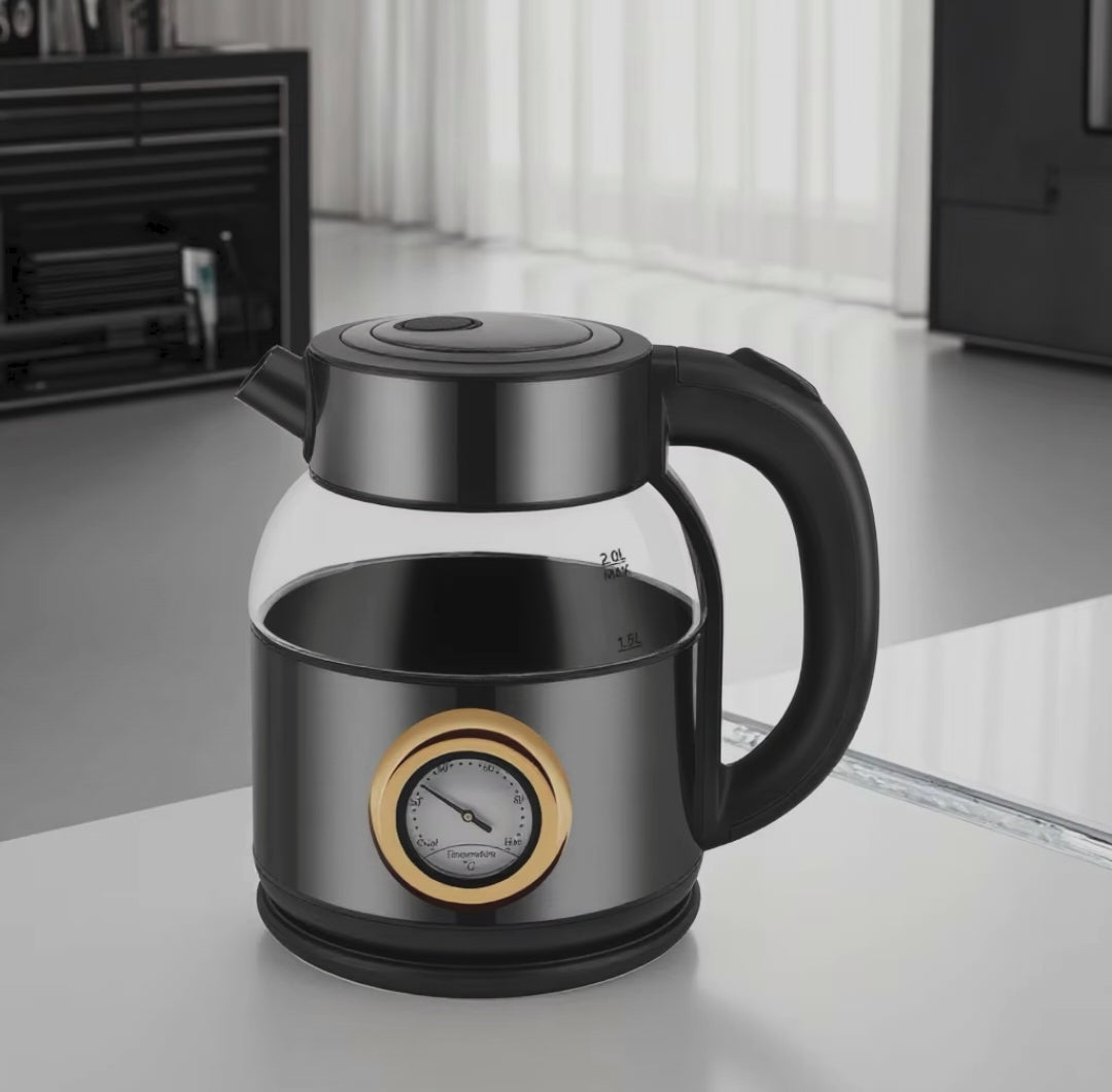 2-litre electric glass kettle with built-in temperature gauge, stainless steel heating element, and 360-degree cordless base for efficient water boiling and beverage preparation
