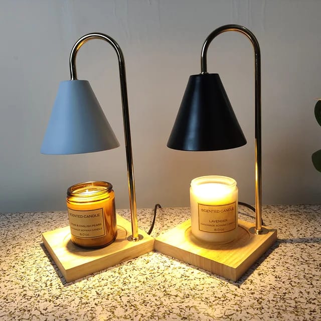 Electric metal candle warmer lamp available in black and white for warming candles without a traditional flame in bedrooms, living rooms, offices, and indoor spaces