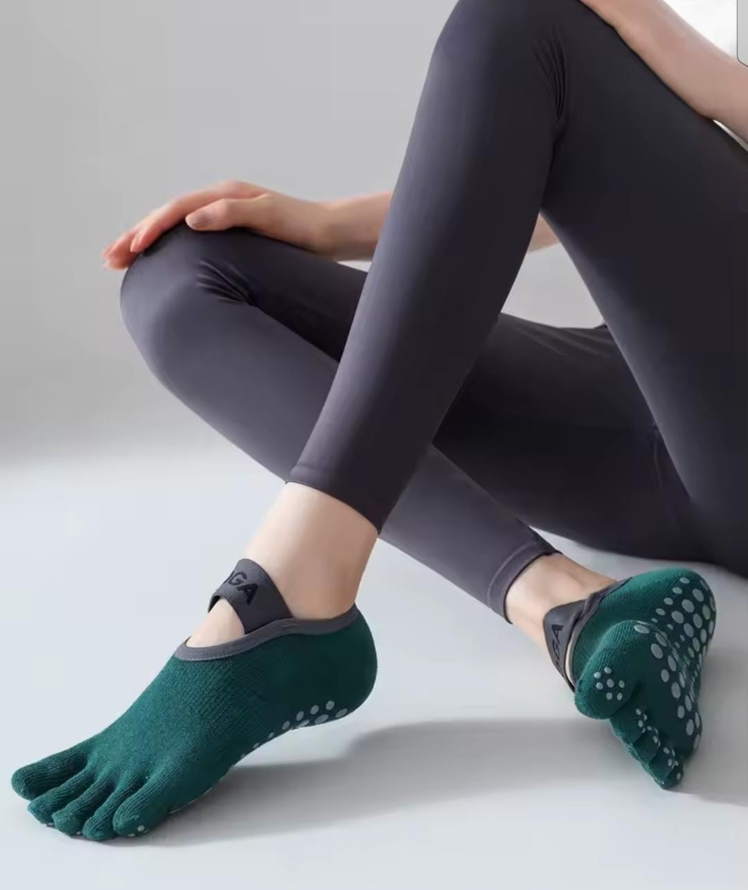 exercise socks with separated toes and anti-slip silicone grip for yoga, Pilates, barre, and home workouts.