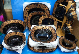 38pcs black flowered dinner set with plates, bowls, cups, saucers, serving bowl and platter.