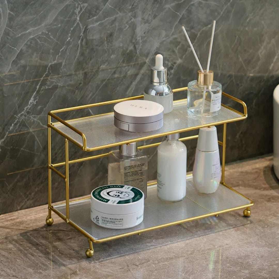 Gemelli Colllection 2 tier gold makeup vanity countertop organizer luxury beauty storage rack electroplated gold metal frame skincare perfume organiser bathroom dresser countertop display shelf elegant cosmetic storage stand modern vanity organiser