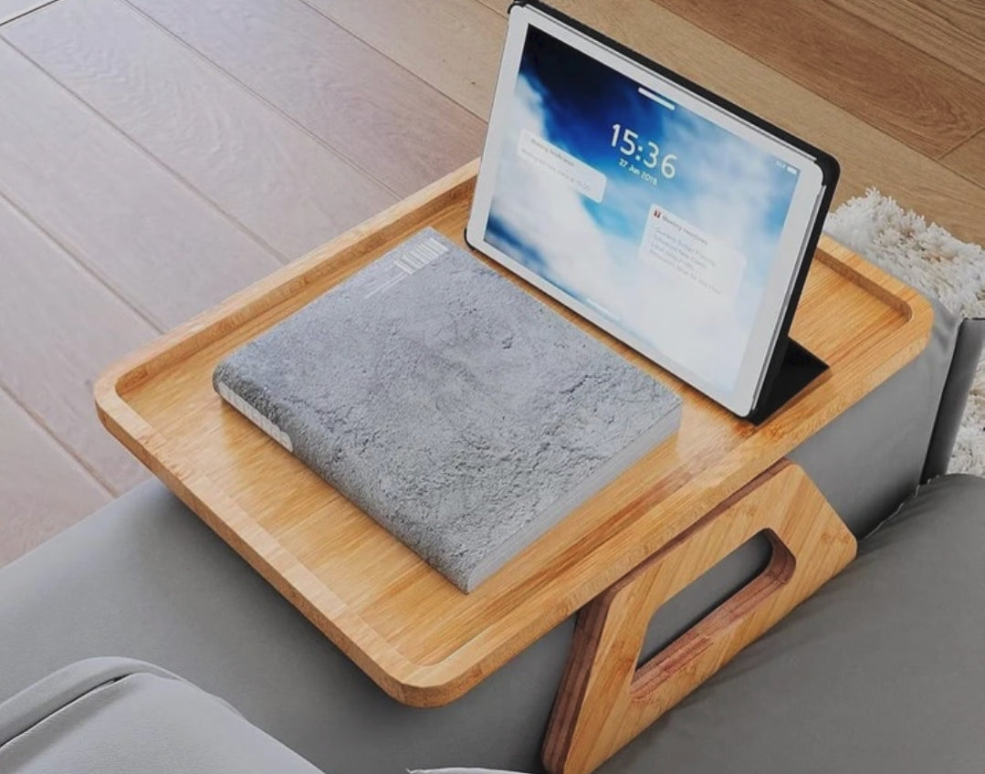 Foldable wooden sofa armrest tray measuring 33 x 24cm with clip-on design for holding drinks, snacks, phones, remotes, and everyday essentials
