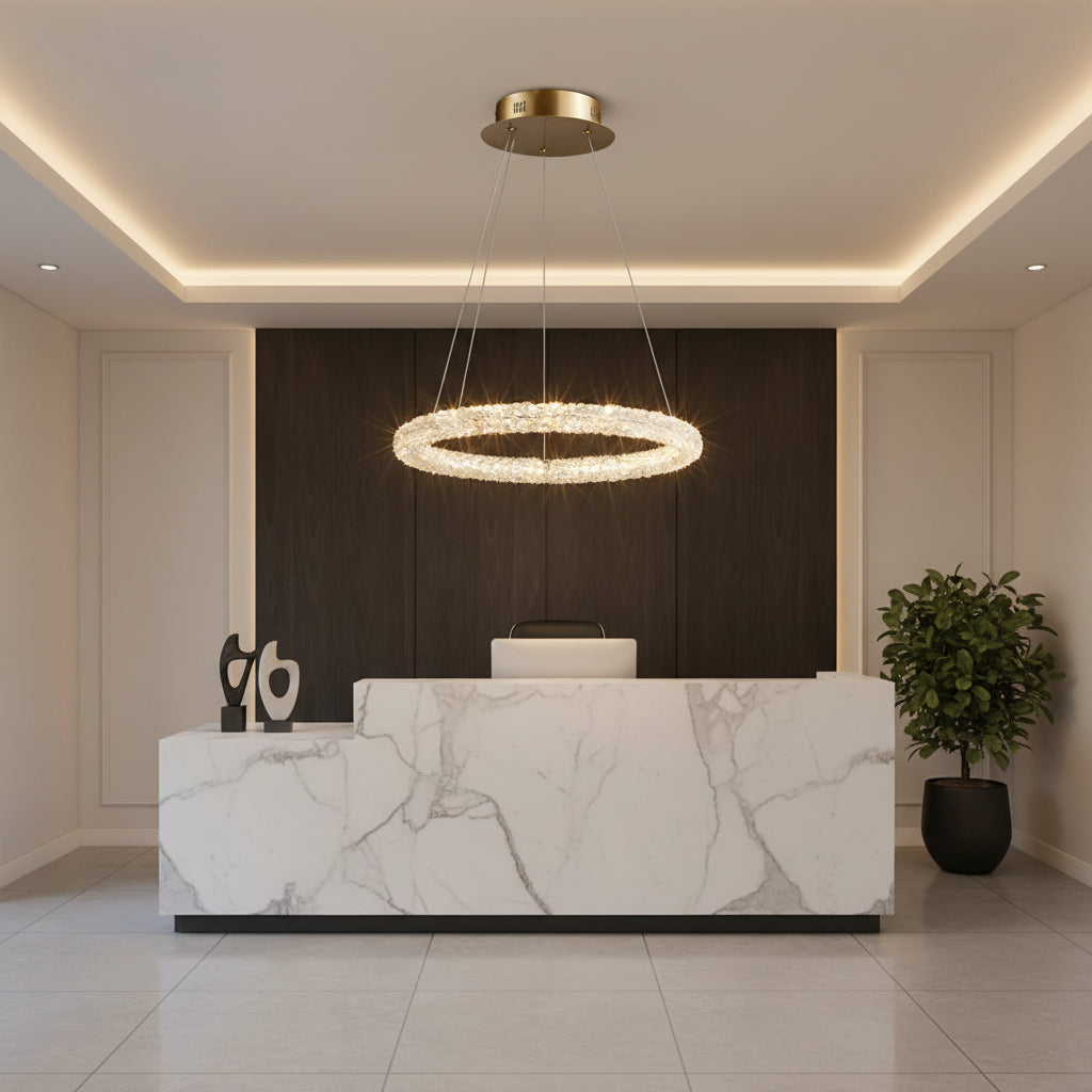 Gemelli Collections crystal ring LED chandelier with gold canopy, floating halo design, clear crystal glass ring, and integrated LED lighting for luxury dining rooms and modern interiors.