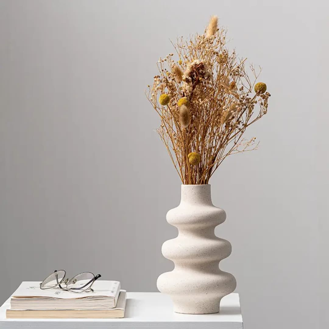 Spiral shaped decorative flower vase minimalist modern home décor vase for dried flowers artificial arrangements coffee tables shelves and living room decoration.