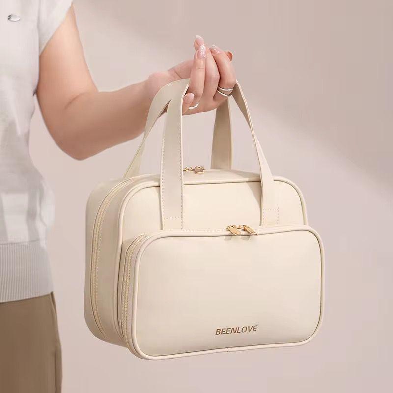 Breathable cosmetics organizer bag for makeup and toiletry storage