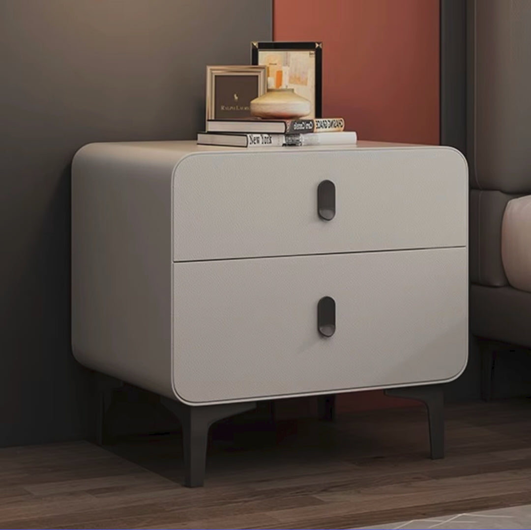 Bedside cabinet with spacious tabletop, drawer, and lower storage compartment for organising books, chargers, accessories, and personal items in bedrooms and guest rooms