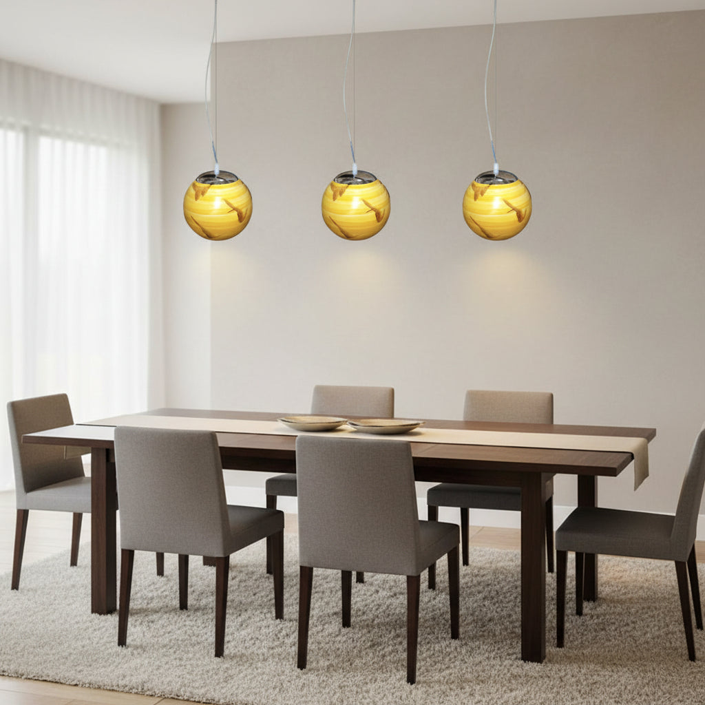 Gemelli Collections yellow hand-painted globe pendant light with abstract brown patterns, glossy finish, chrome cap, and decorative ceiling-mounted design for artistic modern interiors.