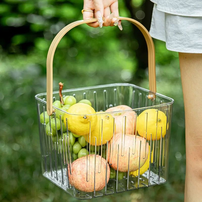 Basket storage organizer with handle for multipurpose household storage including toiletries pantry items cleaning supplies stationery and everyday essentials.