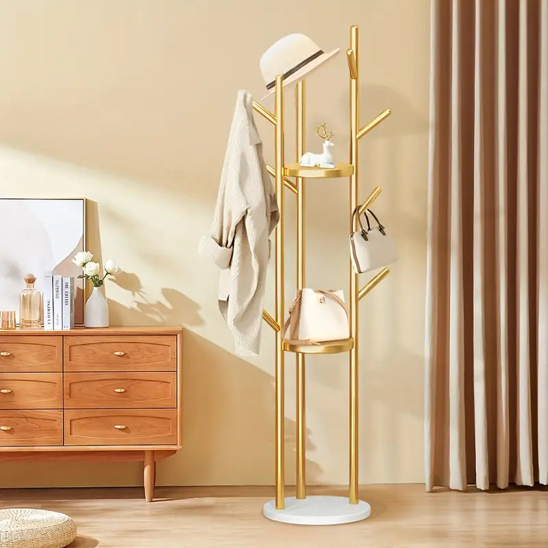Golden coat tree stand with durable metal frame for organising coats bags hats and accessories in entryways bedrooms hallways and offices