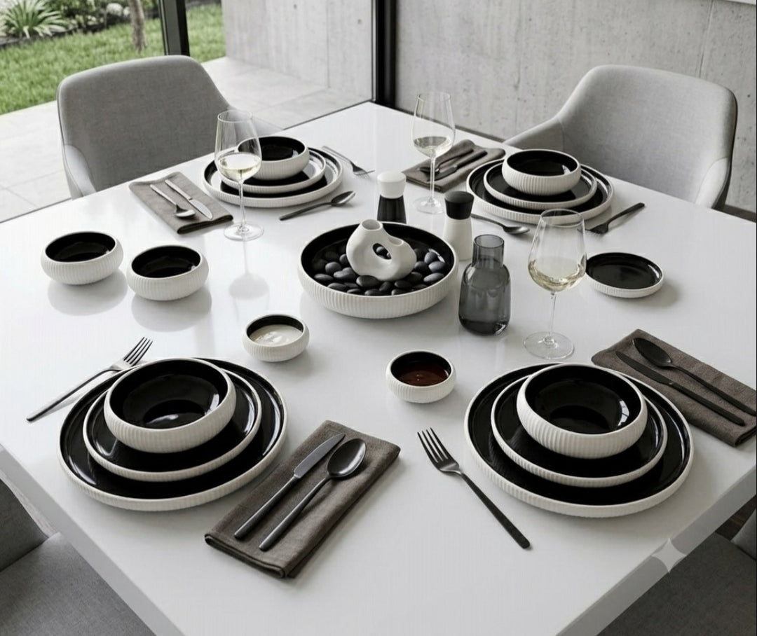 Gemelli Collections 24-piece ceramic dinner set with minimalist design and coordinated serving pieces for everyday dining and entertaining.