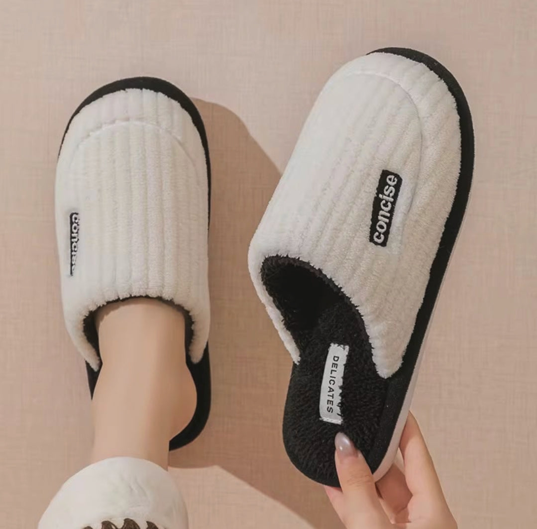 Indoor warm slippers with soft comfortable design for keeping feet cosy and comfortable during everyday home use