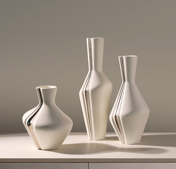 Three-piece modern ceramic vase set for home and office décor, suitable for flowers and decorative display