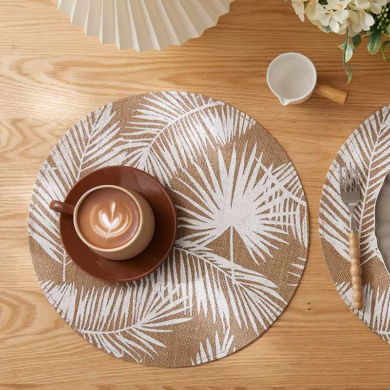 6 piece round table placemat set with elegant leaf pattern design for dining tables coffee tables heat protection and decorative table styling.