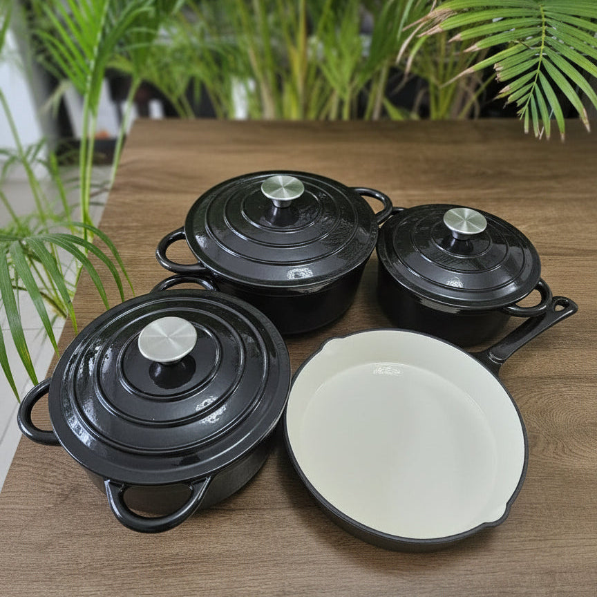 7-piece cast iron cookware set including 3 sufurias, 3 lids, and 1 pan