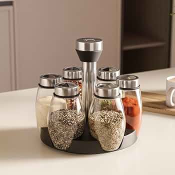 7-piece rotating spice jar set with six glass jars and a rotating stand for organised kitchen seasoning storage.