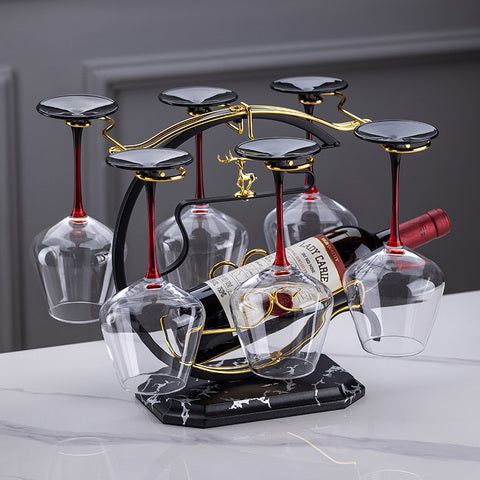 Golden deer wine rack with one bottle slot and six wine glass holders for organised wine storage and decorative display in dining rooms and home bars