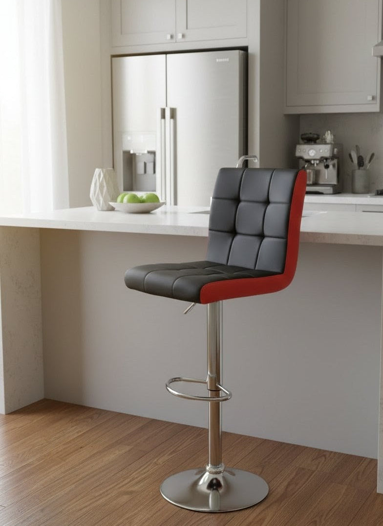Adjustable black bar stool with red detailing, padded seat, chrome base, and swivel function